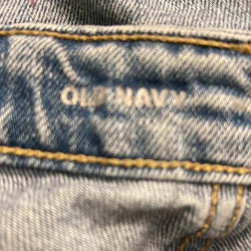 Old Navy - medium wash distressed blue jean shorts - button fly - size 18